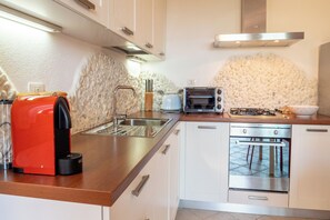 Réfrigérateur, four, plaque de cuisson, lave-vaisselle