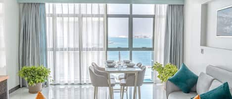 Suite, Partial Ocean View | Living area | 42-inch Smart TV with digital channels, TV