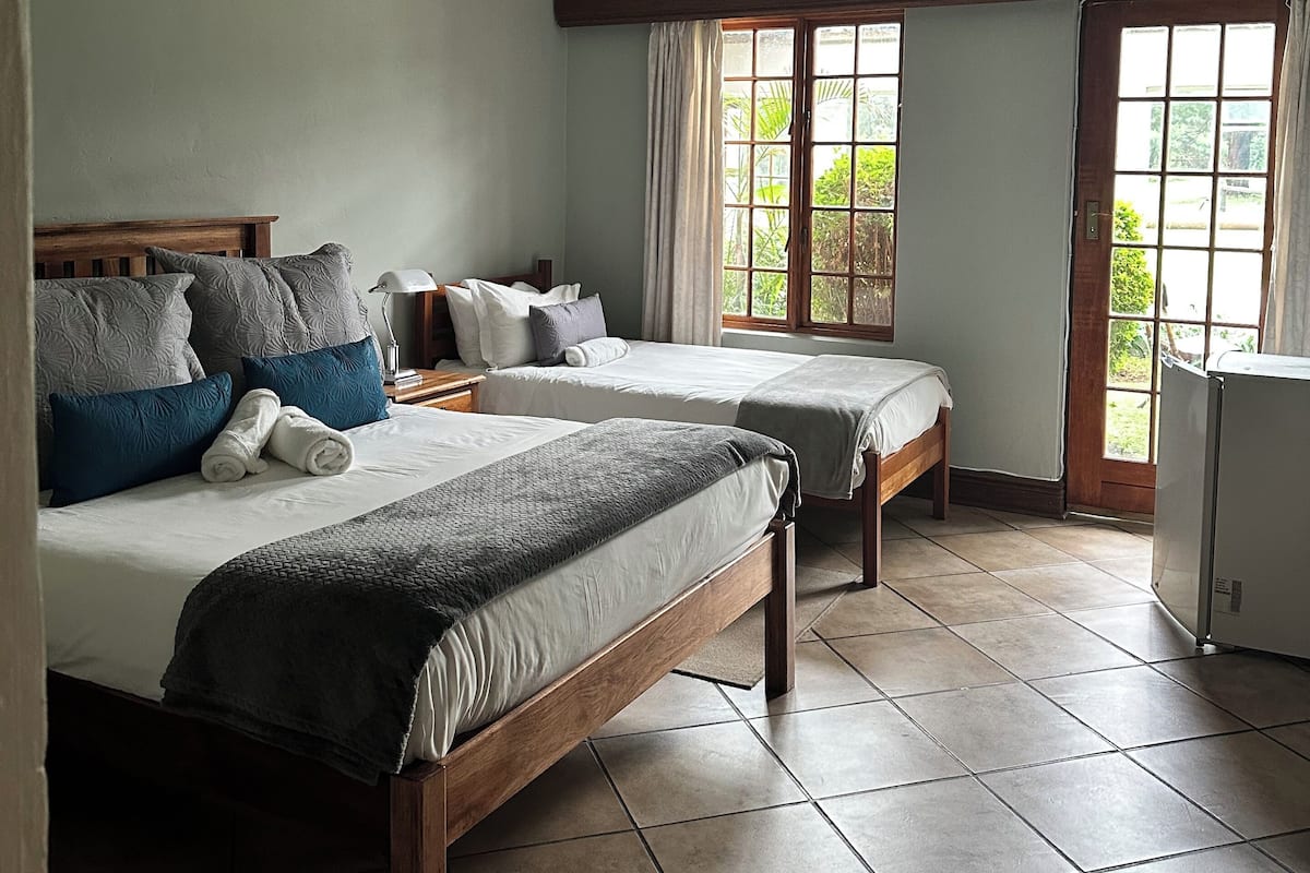Comfort Triple Room, Garden View, Ground Floor | 9 bedrooms, free WiFi, bed sheets