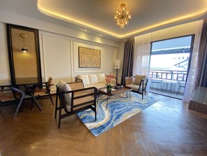 Club Suite | Living area | 50-inch Smart TV with cable channels, TV, foosball - Bertam Resort and Water Park Penang (Kepala Batas)