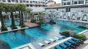 Outdoor pool, open 7:00 AM to 8:00 PM, pool umbrellas, pool loungers