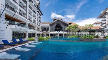 Outdoor pool, open 7:00 AM to 8:00 PM, pool umbrellas, pool loungers