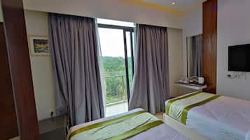 Twin Room | Minibar, in-room safe, iron/ironing board, free WiFi