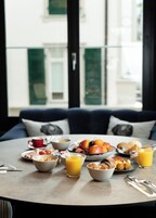 Daily buffet breakfast (CHF 25 per person)