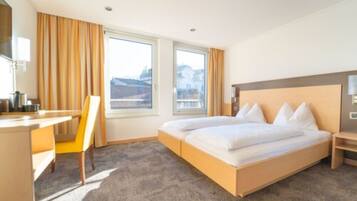 Habitación doble estándar | Caja de seguridad en la habitación y insonorización