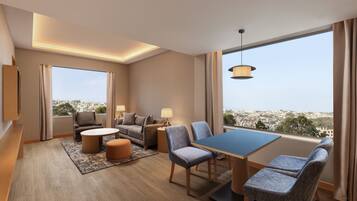 Premium bedding, free minibar items, in-room safe, desk