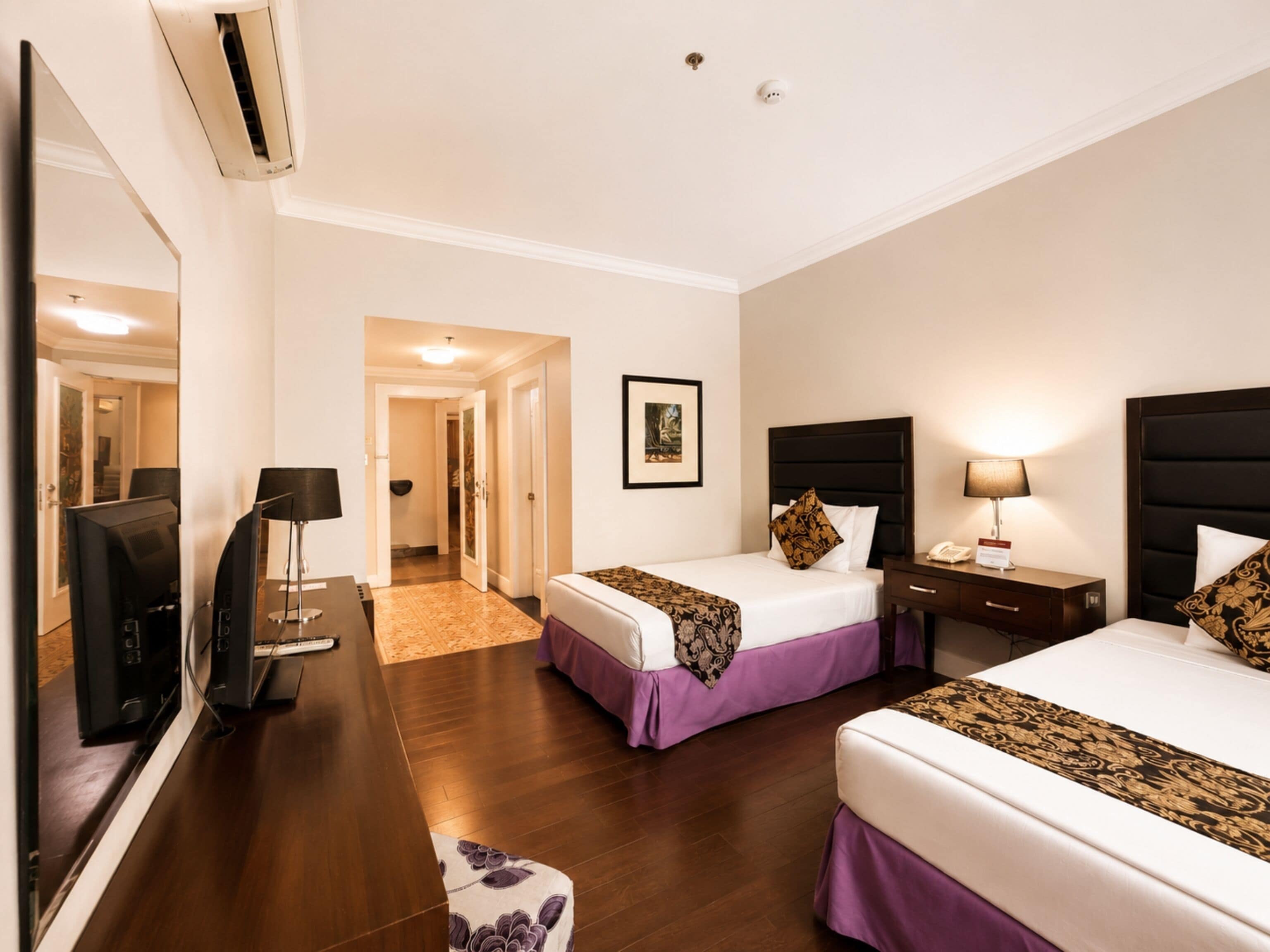 Deluxe kamer | Een minibar, een bureau, gratis wifi, beddengoed