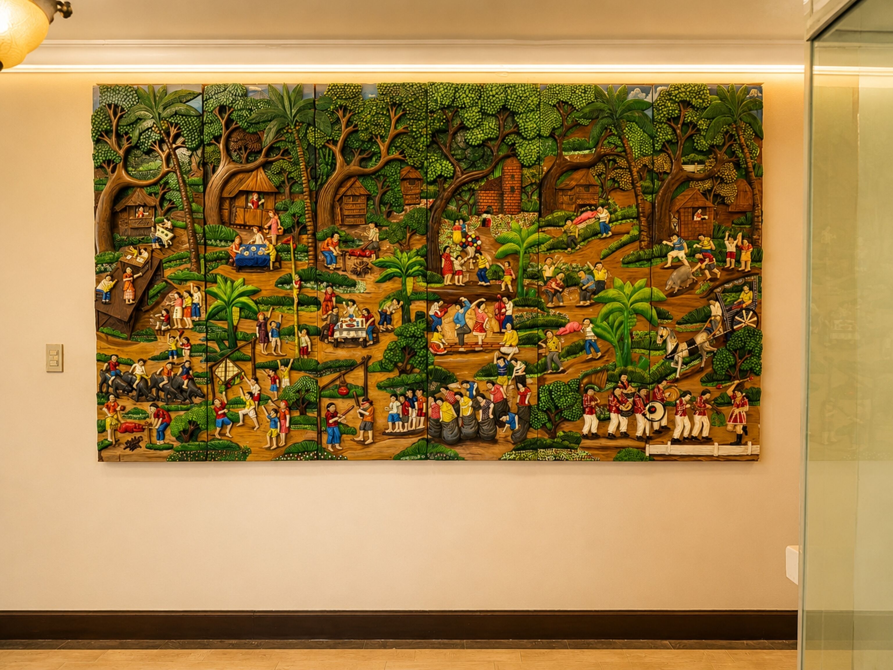 A large mural depicting a vibrant, detailed scene with various figures and activities.