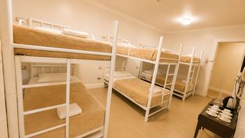 Family Room | Minibar, desk, WiFi (free), bed sheets