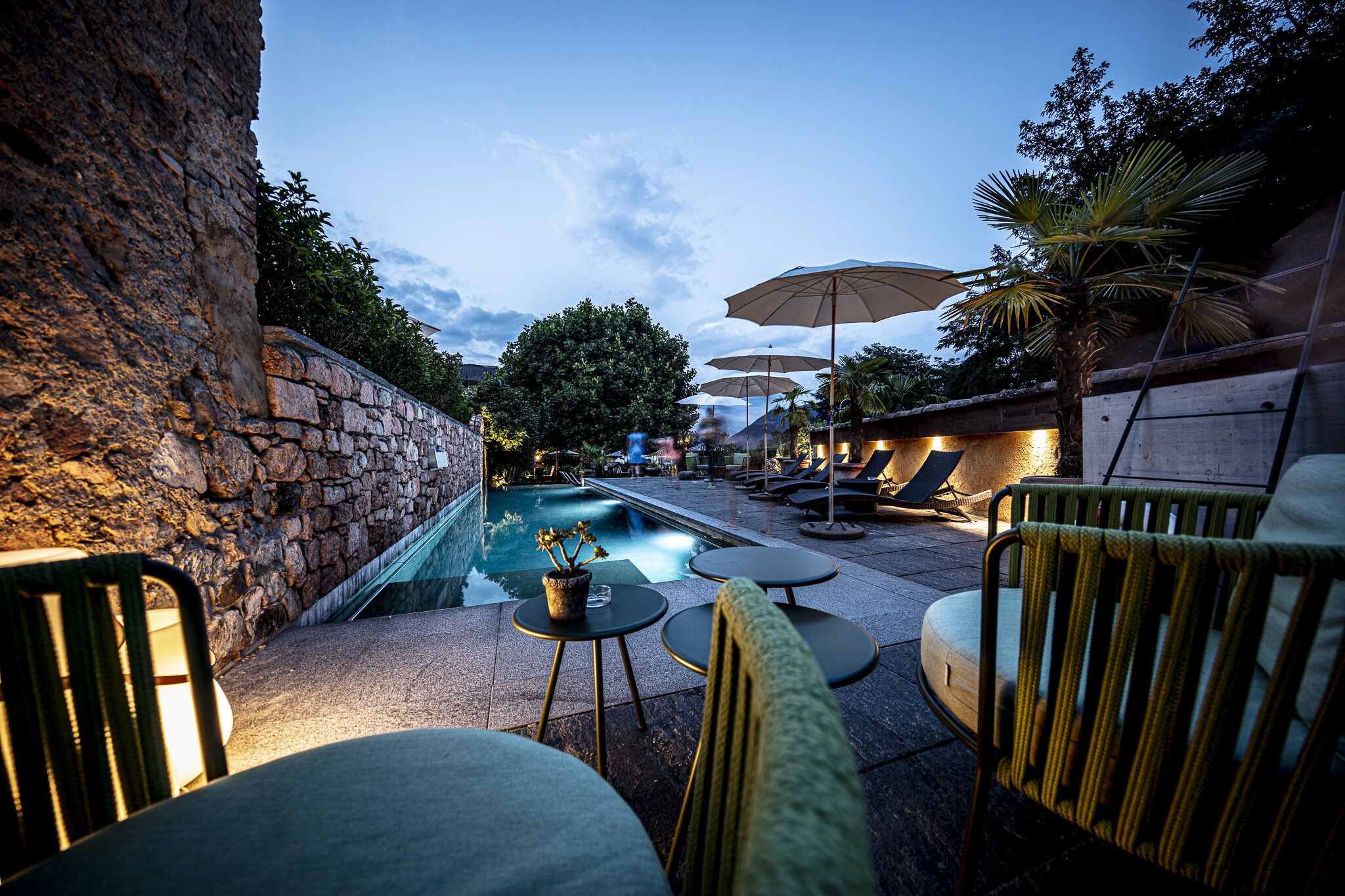 Seasonal outdoor pool, open 7:30 AM to 9:00 PM, pool umbrellas