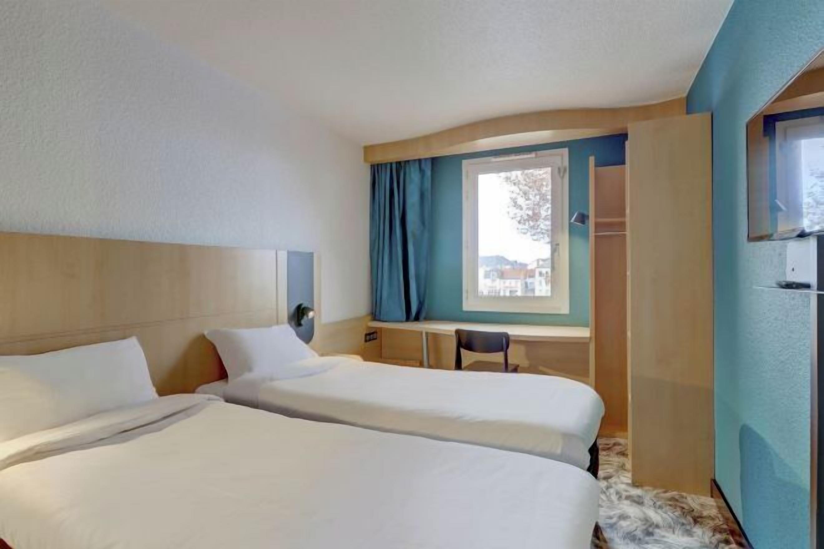 Desk, free WiFi, bed sheets