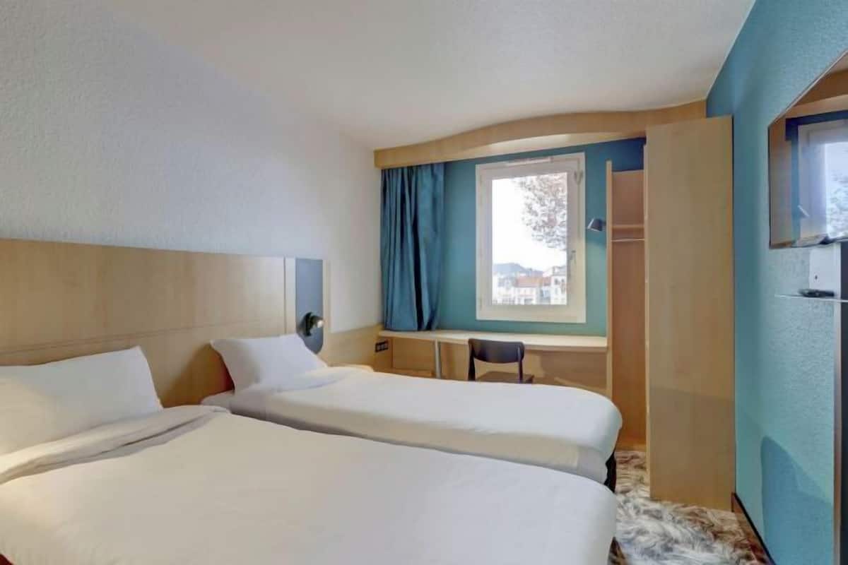 Desk, free WiFi, bed sheets