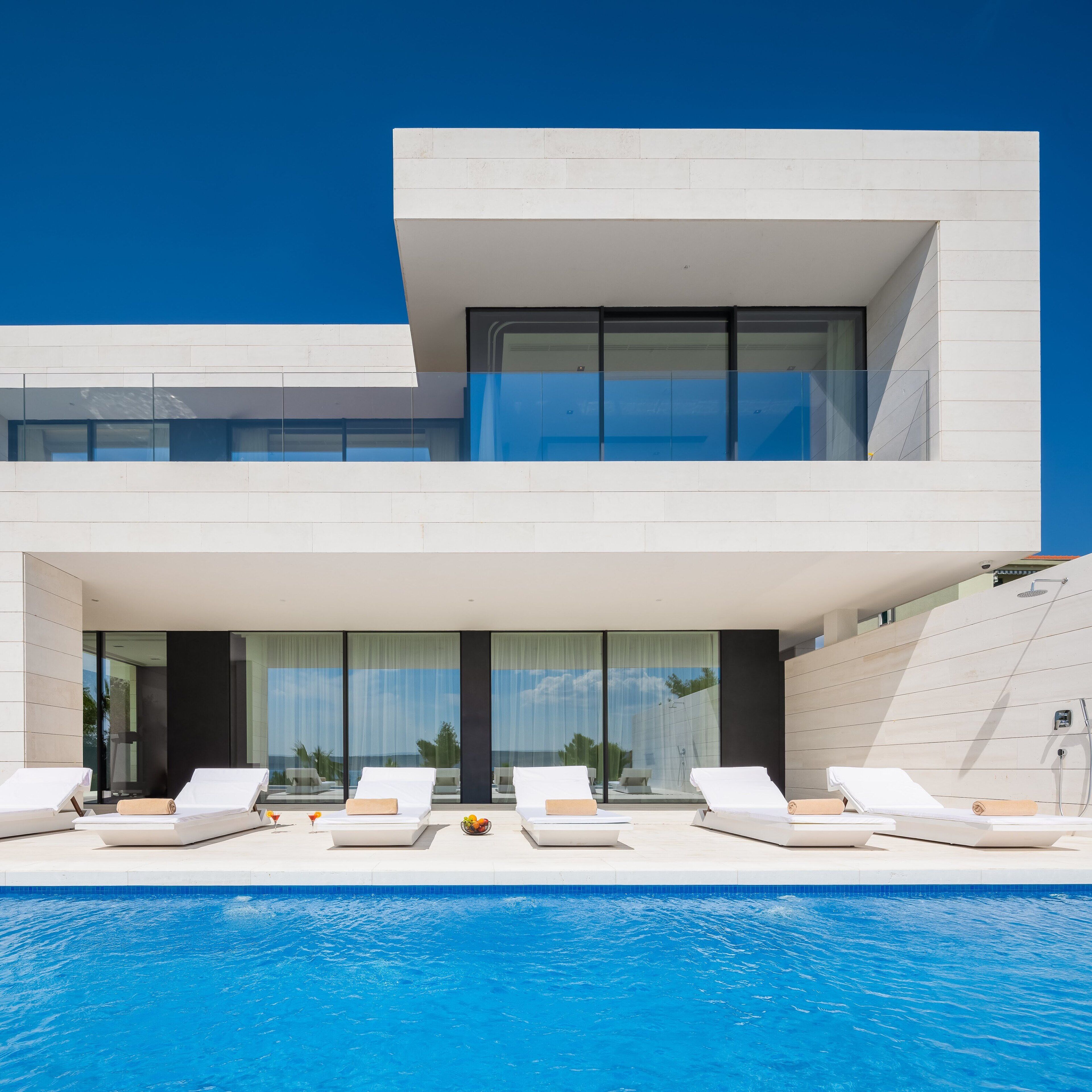 Seasonal outdoor pool, pool umbrellas, pool loungers