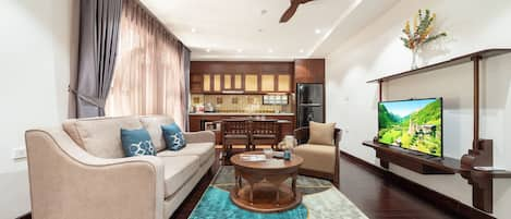 Family Room, 2 Bedrooms | Living area | 50-inch Smart TV with cable channels, TV