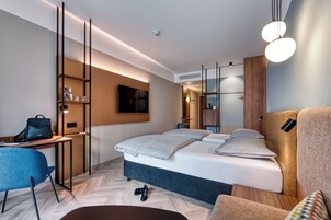 Hypo-allergenic bedding, in-room safe, desk, soundproofing