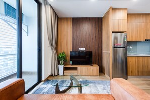 Chambre Double Deluxe, 1 grand lit, non-fumeur, balcon | Coin séjour