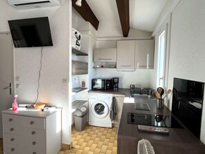 Fridge, microwave, stovetop, coffee/tea maker