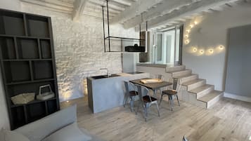 Apartamento superluxo | Área de estar | TV de tela plana