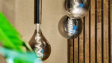 Two pendant lights with a metallic finish hanging from the ceiling.