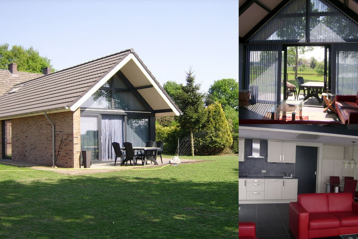 Une maison avec un patio, un coin repas et une cuisine.