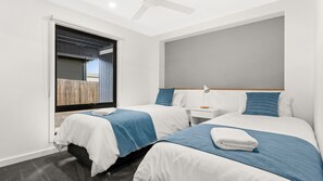 4 bedrooms, iron/ironing board, travel crib, internet