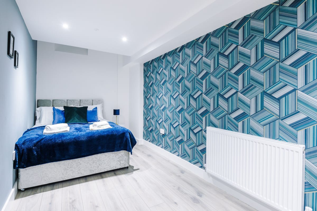 Departamento, 2 habitaciones | Tabla de planchar con plancha, wifi gratis y ropa de cama