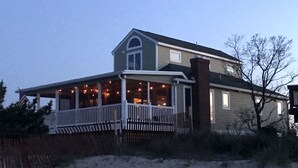 A two-story house with a porch and a chimney. - Primehook Beach Bayfront Beauty (Milford)