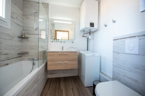 Bathtub, hair dryer