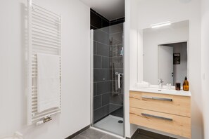 Shower, free toiletries, hair dryer, towels