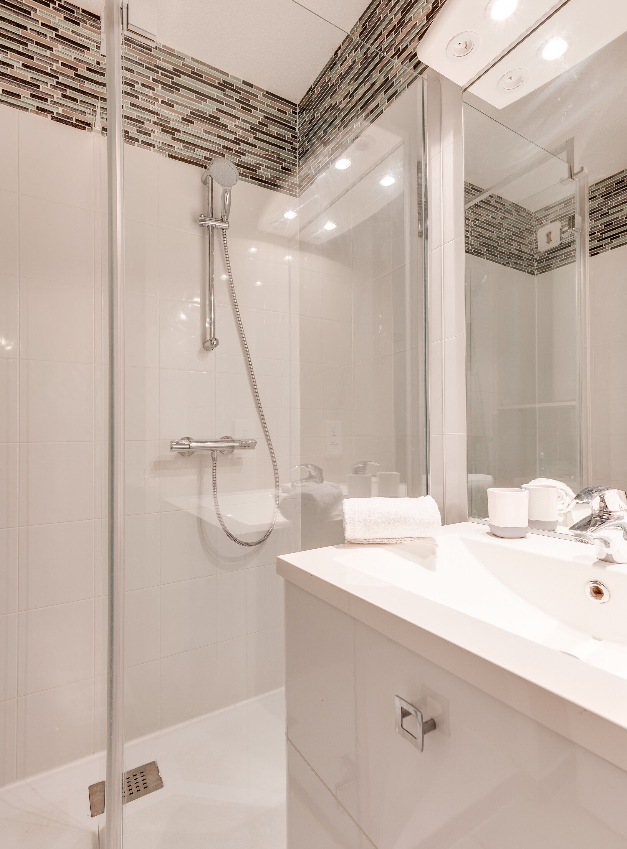 Shower, free toiletries, hair dryer, towels