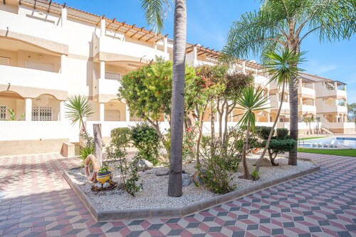 Ferienwohnung "Playasol" mit Gemeinschaftspool, privater Terrasse und Klimaanlage