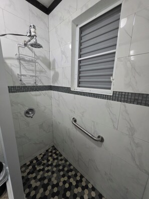 Shower, hair dryer, towels, soap