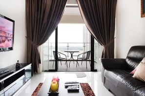 TV, offices - High-Floor 2BR Suite, Water Views, Free Parking (Johor Bahru)