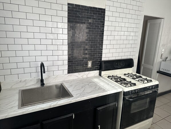 Fridge, microwave, stovetop, electric kettle