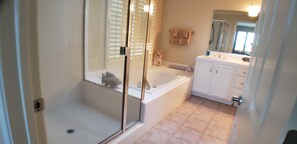 Shower, eco-friendly toiletries, hair dryer, towels