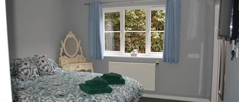 1 dormitori, planxa i posts de planxar, wifi gratuïta i roba de llit