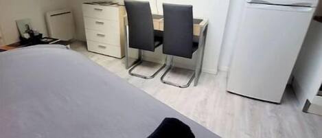 Desk, travel crib, free WiFi, bed sheets