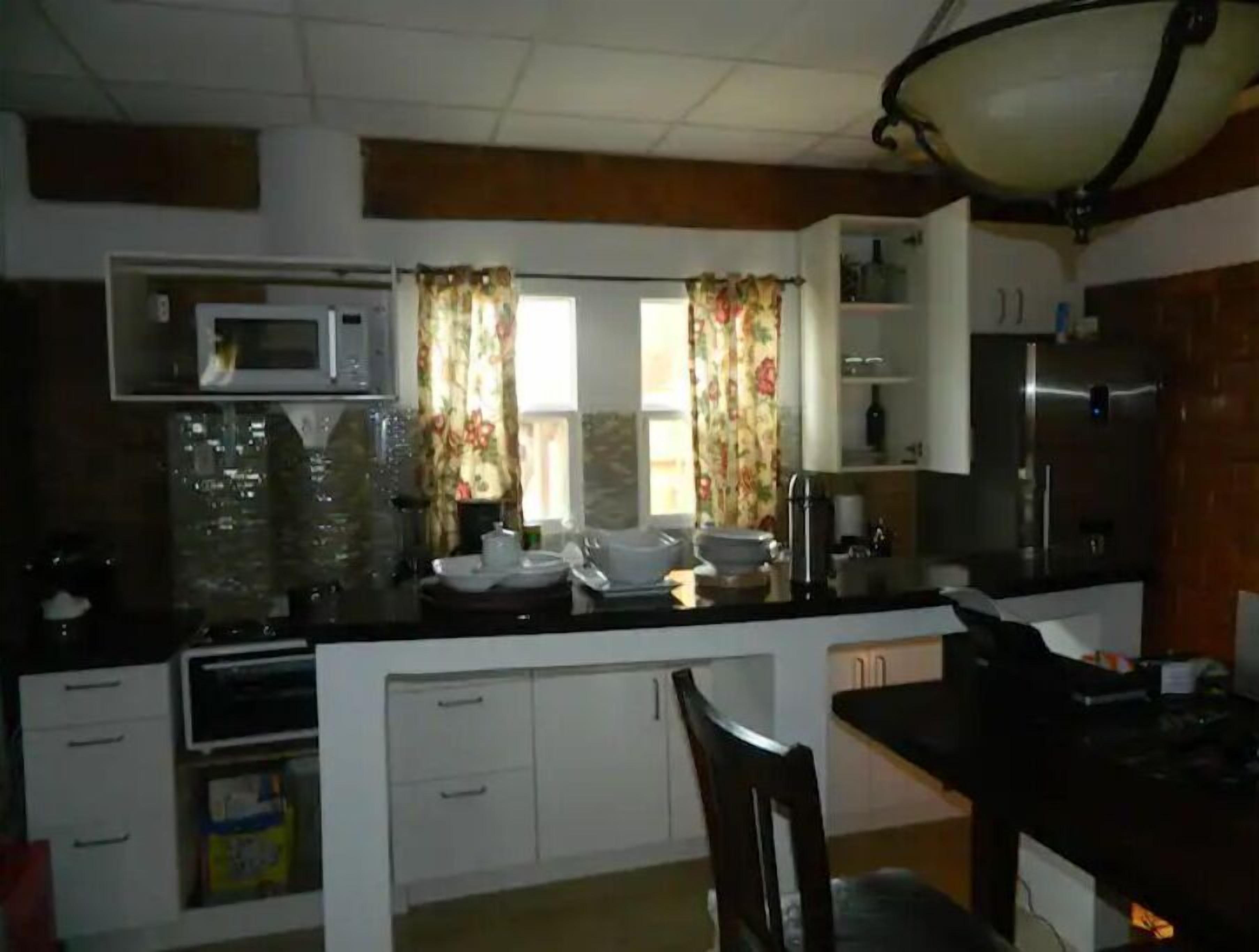 Fridge, microwave, cookware/dishes/utensils