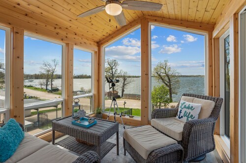 Cozy, year-round lake home with magnificent sunset views, lake access and dock.