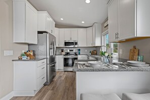 Fridge, microwave, oven, stovetop - Cozy, year-round lake home with magnificent sunset views, lake access and dock. (Faribault)