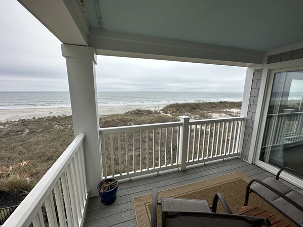 A balcony with a view of the beach and ocean. - Coastal Vista Charm + Seaside Paradise Retreat (North Myrtle Beach)