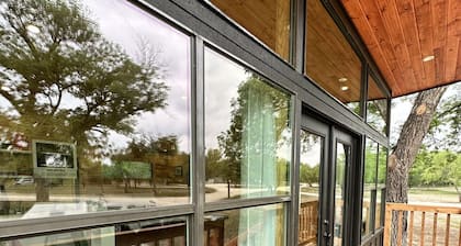 A cabin in the Texas Hill Country offers spectacular views of the Nueces River.