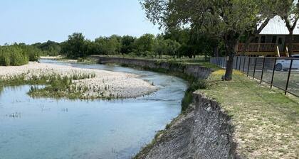 A cabin in the Texas Hill Country offers spectacular views of the Nueces River.