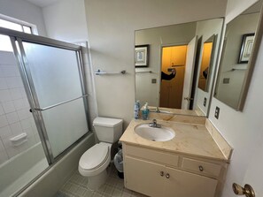 Hair dryer, towels, soap, shampoo