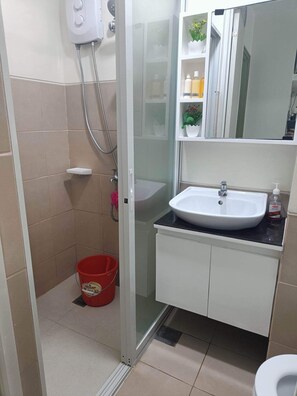 Hair dryer, towels, soap, shampoo