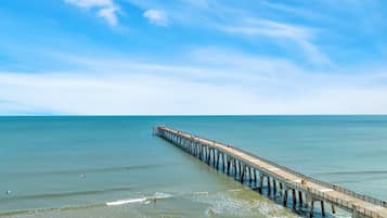 On the beach, sun loungers, beach towels