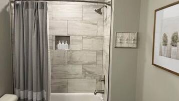 Hair dryer, towels, soap, shampoo