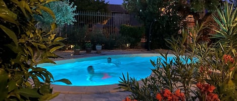 Seasonal outdoor pool, pool umbrellas, pool loungers