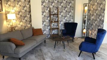 Comfort Apartment | Living area | Flat-screen TV