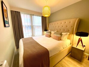 2 dormitorios, tabla de planchar con plancha, wifi y ropa de cama